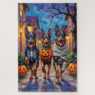 Belgische Schäferhunde beim Halloween-Süßigkeiten- Puzzle