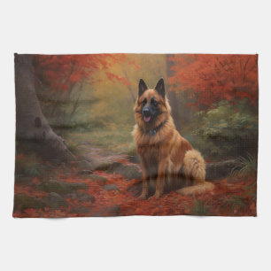 Belgischer Schäferhund im Herbstlaubfall inspirier Geschirrtuch