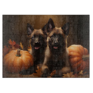 Belgischer Schäferhund-Welpe Herbstfreude Kürbis Schneidebrett