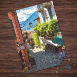 Bellagio, Altstadt (Comer See, Italien) Puzzle<br><div class="desc">Dieses Rätsel zeigt ein originelles Foto mit einem wunderschönen Ausblick auf eine charakteristische Gasse im alten Zentrum von Bellagio,  einem hübschen Dorf am Ufer des Comer Sees (Italien) mit seinen schönen mittelalterlichen Steintreppen.</div>