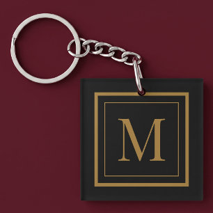 Benutzerdefiniertes Monogramm mit schwarzem und go Schlüsselanhänger
