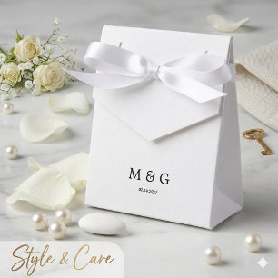 Benutzerdefiniertes Monogramm und Datumssymbol des Geschenkschachtel