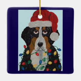 Berner Sennenhund in Weihnachtslichtern verheddert Keramikornament