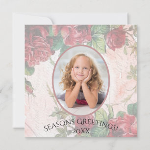 Beschädigte Rote Rosen, die auf Papier geschrieben Feiertagskarte
