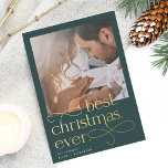 Best Christmas Ever Engagement Photo Folien Feiertagskarte<br><div class="desc">Share the news of your holiday season engagement with these elegant and festive engagement announcement cards featuring a square photo with "best Christmas ever" overlaid in gold foil lettering. Personalize with your announcement (shown with "we're engaged") and names beneath,  and add additional details to the back.</div>