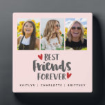 Best Friends Foto Collage Plaque Fotoplatte<br><div class="desc">Ein einfaches und modernes Collage-Display für Ihre beste Freundin mit 3 Fotos und dem Titel Best Friends Forever mit Herzen auf einem schwarz rosa Hintergrund und personalisiert mit Ihrem eigenen Text. Entworfen für Sie von BlackBerry Boulevard.</div>