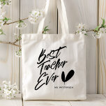 Bester Lehrer je Moderner Black Script Individuell Tragetasche<br><div class="desc">Best Teacher Ever Modern Red Script Individuelle Name Tragetaschen bietet den Text "Best Teacher Ever" in einer lustigen modernen schwarzen Script Typografie und personalisiert mit Ihrem individuelle Name in modernen Typografie-Skripten. Ideal für die Lehrerfreundlichkeit zu Weihnachten,  Geburtstagen und Feiertagen. Entworfen von © Evco Holidays www.zazzle.com/store/evcoholidays</div>