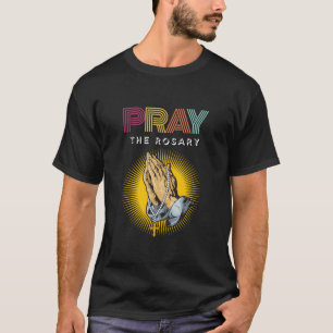 Beten Sie die Rosary Retro Typografie, die Hand mi T-Shirt