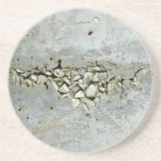 Betonmauer mit kleinen Steinen Getränkeuntersetzer