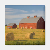 Betriebe | Red Barns Near Hay Bales