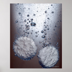 Bicarbonate of soda tablets in water poster
