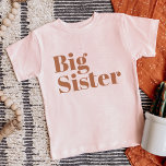 Big Sister | Rust Matching Sibling Family<br><div class="desc">Individuell bedrucktes Kleidungsstück personalisiert mit "Big Sister" Grafik in modernem Schriftart. Ideal für ein Foto zur Schwangerschaftsankündigung oder Geschenk für ältere Geschwister, wenn das neue Baby ankommt! Verwenden Sie die Entwurfswerkzeuge, um die Farben zu bearbeiten oder eigene Texte und Fotos hinzuzufügen, um ein eigenes T - Shirt zu erstellen. Wählen...</div>