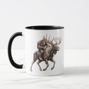 Bigfoot auf einem Elch reitend Tasse