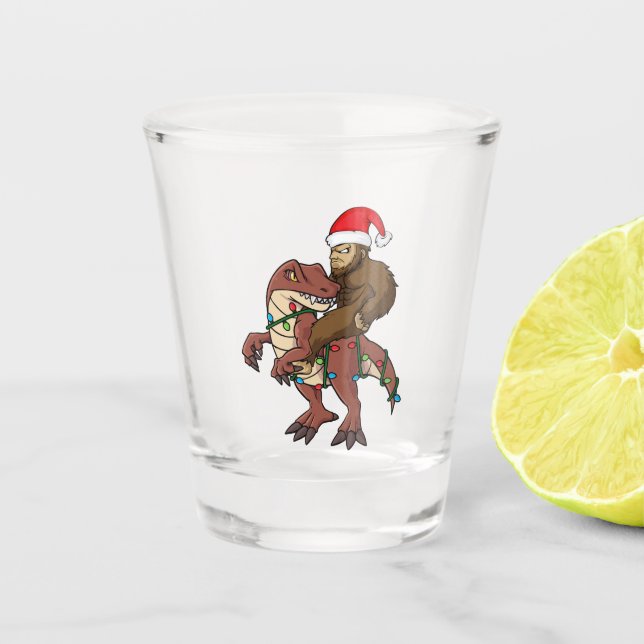 Bigfoot Riding Dinosaurier Weihnachtsbeleuchtung Schnapsglas (Vorderseite)