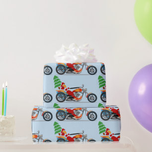 Biker Santa auf einem Chopper mit einem Weihnachts Geschenkpapier