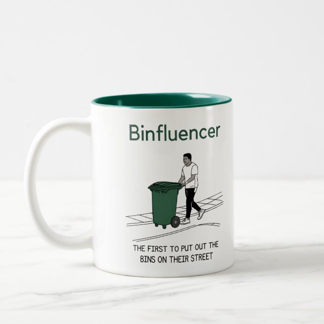 Binfluencer, der erste, der seine Mülleimer ausste Zweifarbige Tasse (Links)