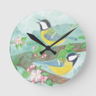 Birds singing on a blossoming tree branch  runde wanduhr