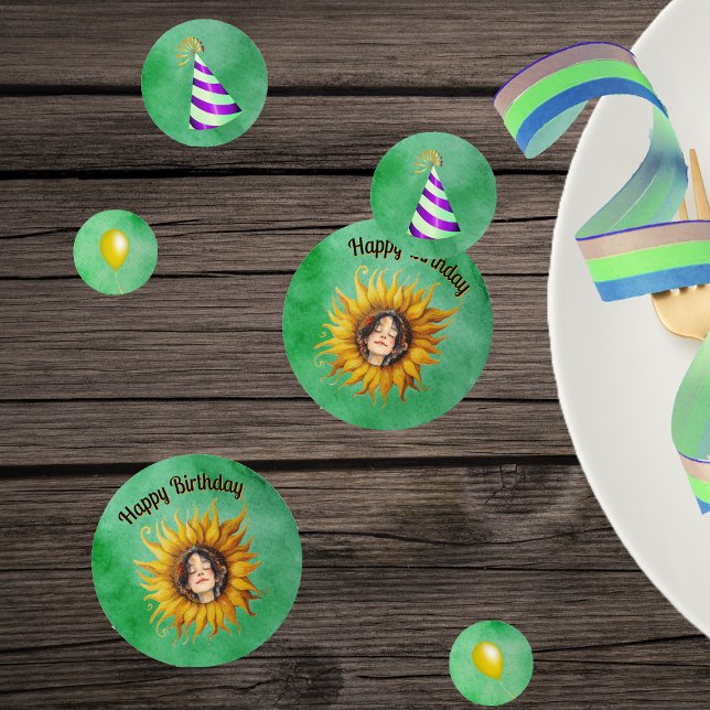 Birthday Girl Pretty Face in Sunflower Hats Green Konfetti (Pretty girl in big yellow sunflower, party hats, yellow balloons on green table Birthday confetti.)