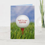 Birthday Golf Ball on T-Shirt für Sister Karte<br><div class="desc">Nahe Aufführung des Golfballs auf rotem Tee in grünem Gras zum Geburtstag der Schwester. Alle Texte können bearbeitet werden.</div>