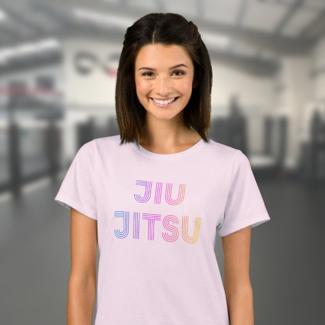 BJJ Funky Brazilian Jiu Jitsu Pink Women's T-Shirt (Light pink women's jiu jitsu t-shirt worn by a female model in the gym.)