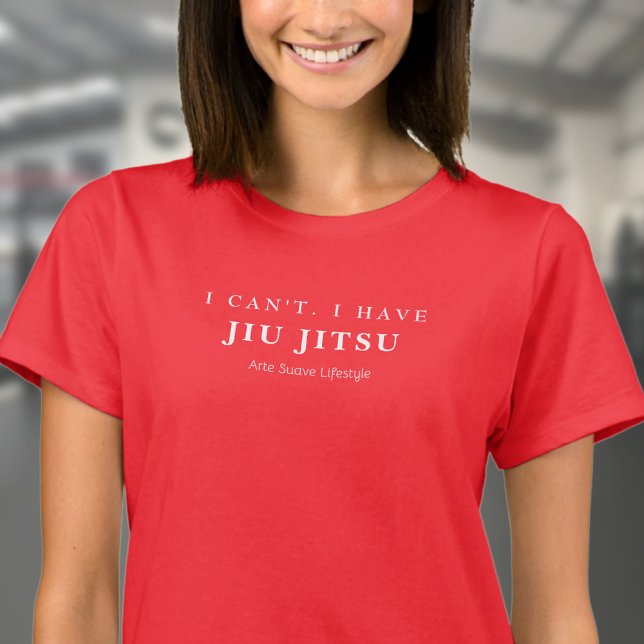 BJJ Ich kann Jiu Jitsu Arte Suave Woman's nicht ha T-Shirt (Woman wearing red BJJ tshirt in a gym.)