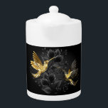 Black and Gold Hummingbird<br><div class="desc">Schmuck aus schwarzem und goldenem Schmuck,  der mit grauem Hintergrund und Pflanze geschmückt ist. Schmuckvögel. Goldener Vogel. Goldvogel.</div>