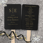 Black and Gold Monogram Wedding Program Fächer<br><div class="desc">Dieses schicke Hochzeitsprogramm kann mit Ihrem Monogramm und besonderen Informationen zum Hochzeitstag personalisiert werden. Entwickelt von Thisisnotme©</div>