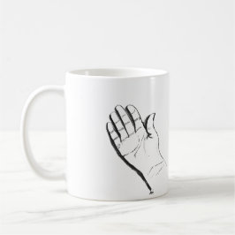 black and white hand on coffee mug kaffeetasse