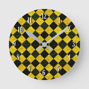 Black and yellow chequered pattern runde wanduhr