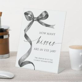 Black Bow wie viele Küsse im Jar sind Sockelschild