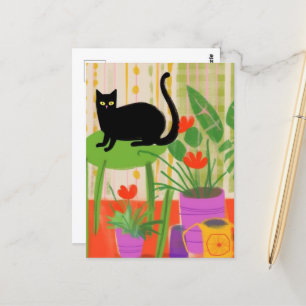 Black Cat auf einem grünen Stuhl Postkarte