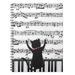 Black Cat On Piano Keys Notizblock