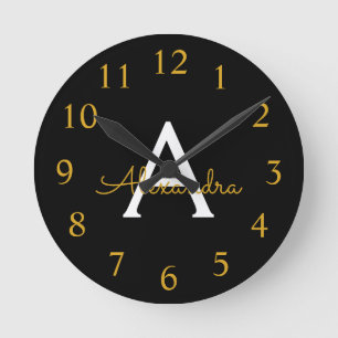 Black Gold Modern Script Girls Monogram Name Runde Wanduhr