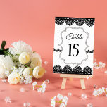 Black Lace on White Custom Wedding Tischnummer<br><div class="desc">Create custom table numbers that match the style of your wedding. These cards are ready to be customized with your own choice of table number. They feature my black lace illustrations set against a white background with a faux quilted look and an ornate white and gray frame for making the...</div>
