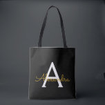 Black Name Gold Girly Script Monogram Modern<br><div class="desc">Schwarz und Gold Elegant Fügen Sie Ihren eigenen Namen Monogram Book Bag. Diese Büchertasche kann auf Ihren Vor- und Vornamen angepasst werden und als Geschenk für Weihnachten,  Geburtstag,  Brautparty oder Hochzeit.</div>