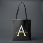 Black Name Gold Girly Script Monogram Modern<br><div class="desc">Schwarz und Gold Elegant Fügen Sie Ihren eigenen Namen Monogram Book Bag. Diese Büchertasche kann auf Ihren Vor- und Vornamen angepasst werden und als Geschenk für Weihnachten,  Geburtstag,  Brautparty oder Hochzeit.</div>