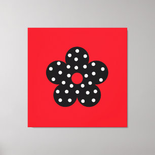 Black Polka Dot Blume über den roten Hintergrund Leinwanddruck