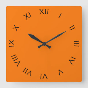 Black Roman Numbers On Orange wccn Quadratische Wanduhr
