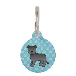 Black Staffordshire Bull Terrier Dog On Blue Tiermarke