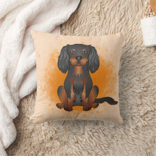 Black & Tan Cavalier King Charles Dog auf Orange Kissen