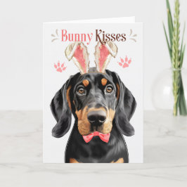 Black Tan Coonhound im sonnigen Ohr für Ostern Feiertagskarte
