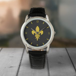 Black Watch mit Gold-Lilie Armbanduhr<br><div class="desc">Eine schwarze Armbanduhr mit goldener Lilie: ein perfektes Geschenk für einen eleganten Mann!</div>