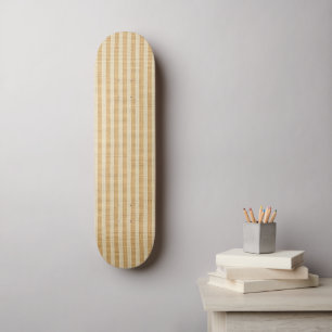 Blassgelbe gestreifte Stoffmuster Skateboard
