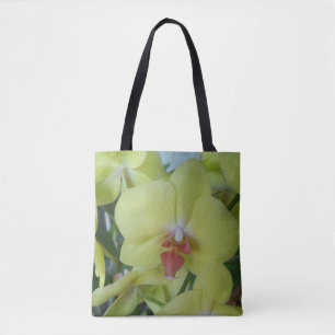 Blassgelbe Motte Orchideen auf einem Totbeutel