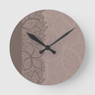 Blatmustergrenze und -hintergrund runde wanduhr