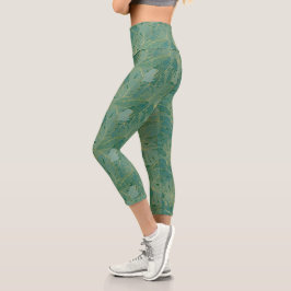 Blätter aus der grünen und goldenen Palme Capri Leggings