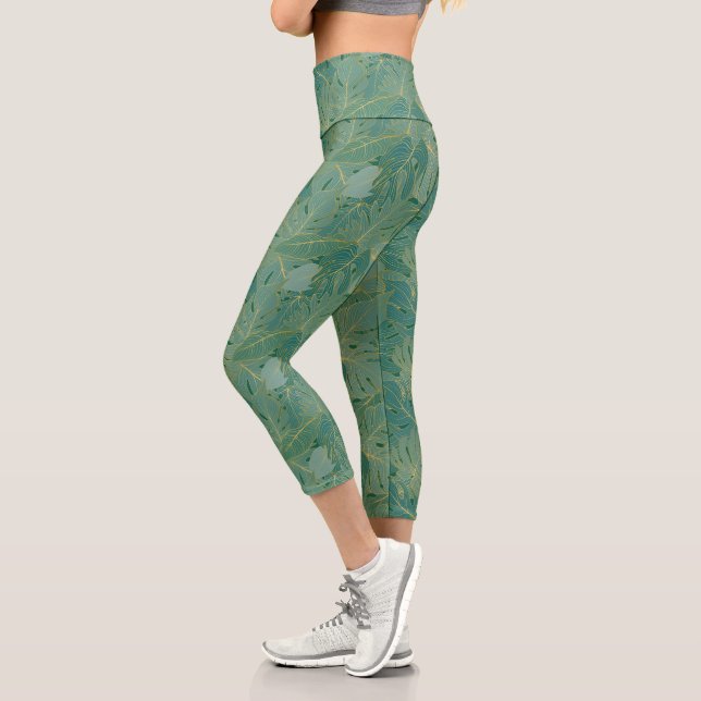 Blätter aus der grünen und goldenen Palme Capri Leggings (Links)