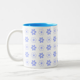 Blau-weißes Blumenmuster auf weißer zweitöniger Ka Zweifarbige Tasse
