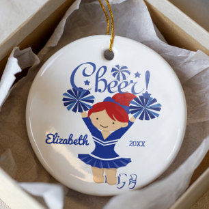 Blau-weißes Cheerleader-Ornament mit roten Haaren Keramikornament