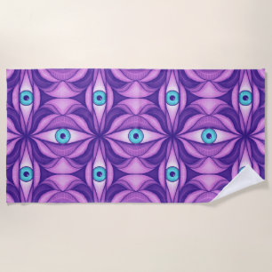 Blaue Augen in violetter Blätterdichte Botanische Strandtuch